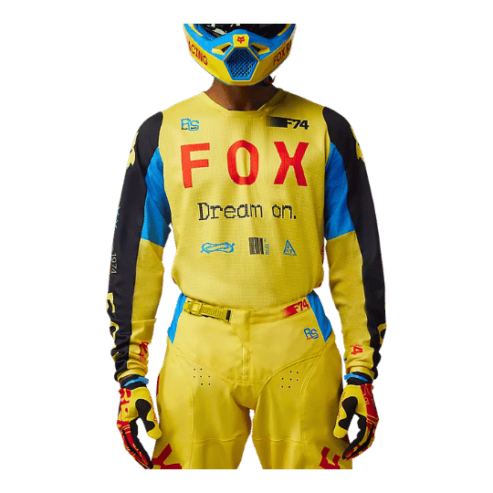 tenue de moto fox racing jaune, bleu et rouge